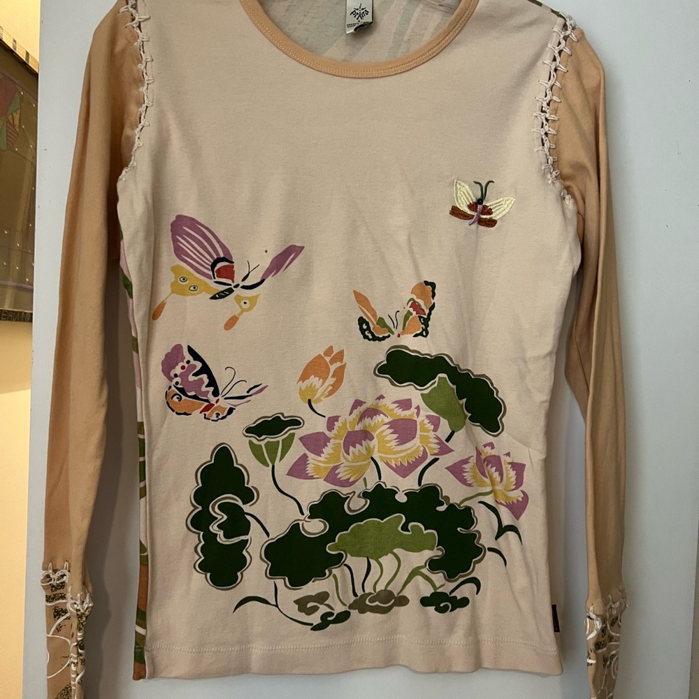 Prana long sleeve top with lacing detail at shoulders and on sleeves